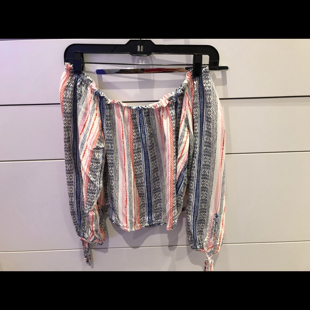 Off the shoulder colorful top.